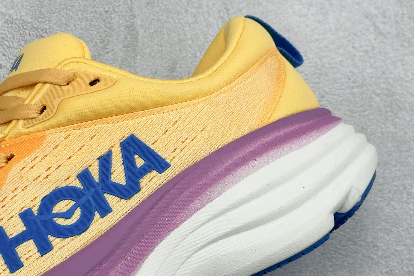 HOKA Bondi 8 Yellow Purple Gradient Blue Logo Running Shoes
