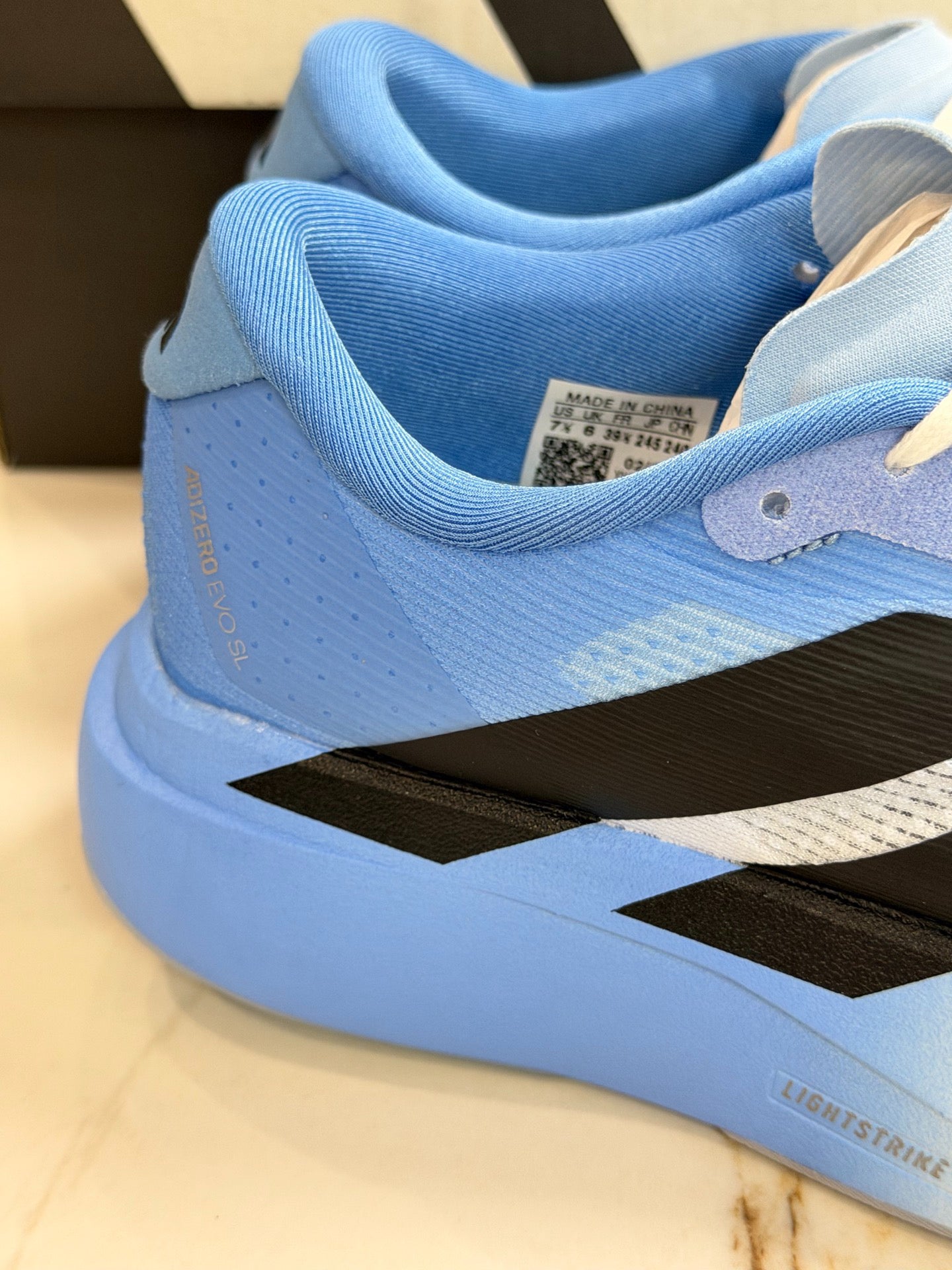adidas Adizero Evo SL Woven "Cloud White / Blue Fusion"