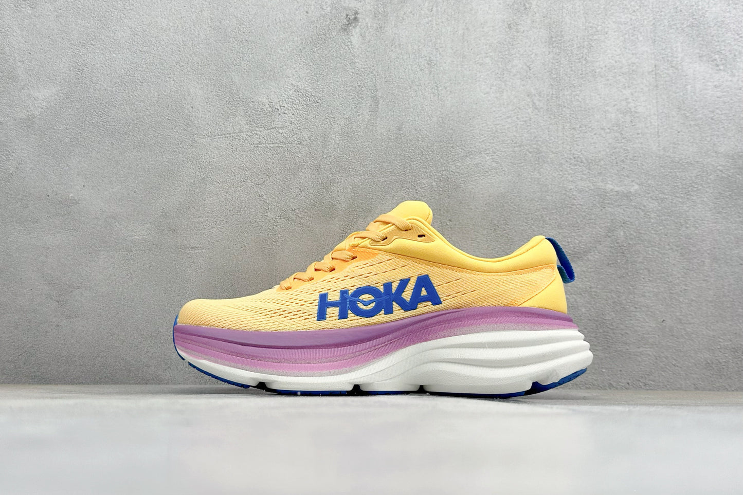 HOKA Bondi 8 Yellow Purple Gradient Blue Logo Running Shoes