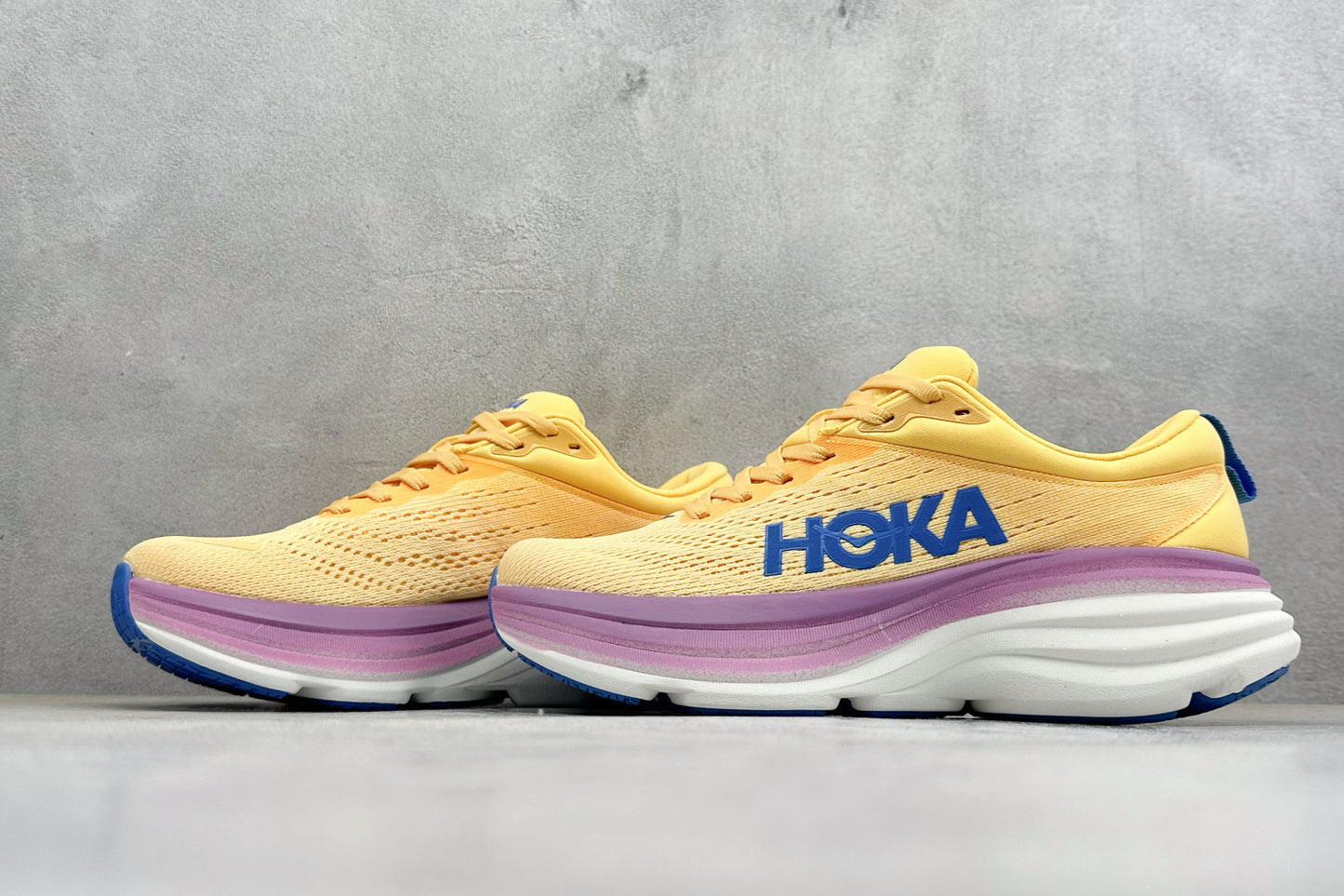 HOKA Bondi 8 Yellow Purple Gradient Blue Logo Running Shoes