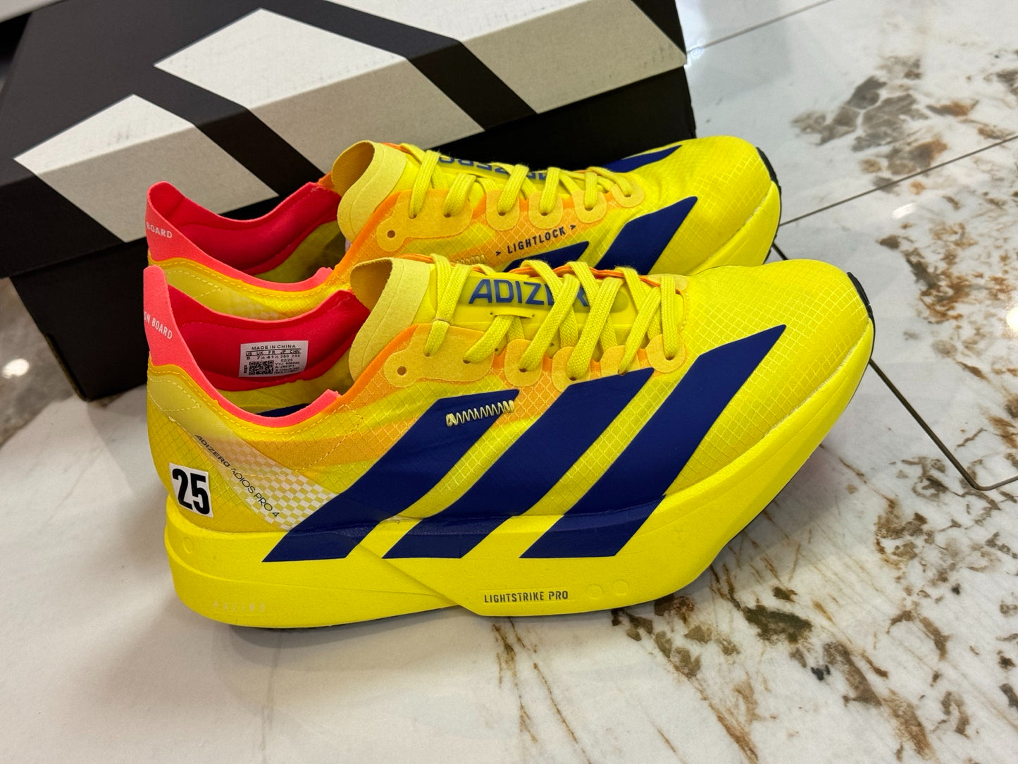 adidas Adizero Adios Pro 4 "Pure Sulfur / Yellow Navy"