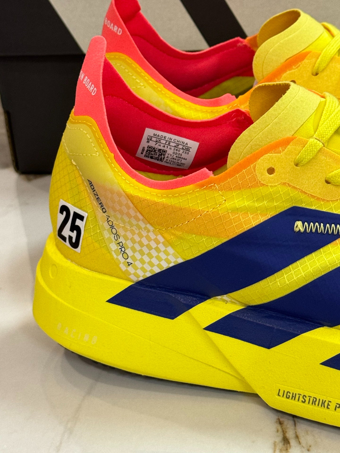 adidas Adizero Adios Pro 4 "Pure Sulfur / Yellow Navy"