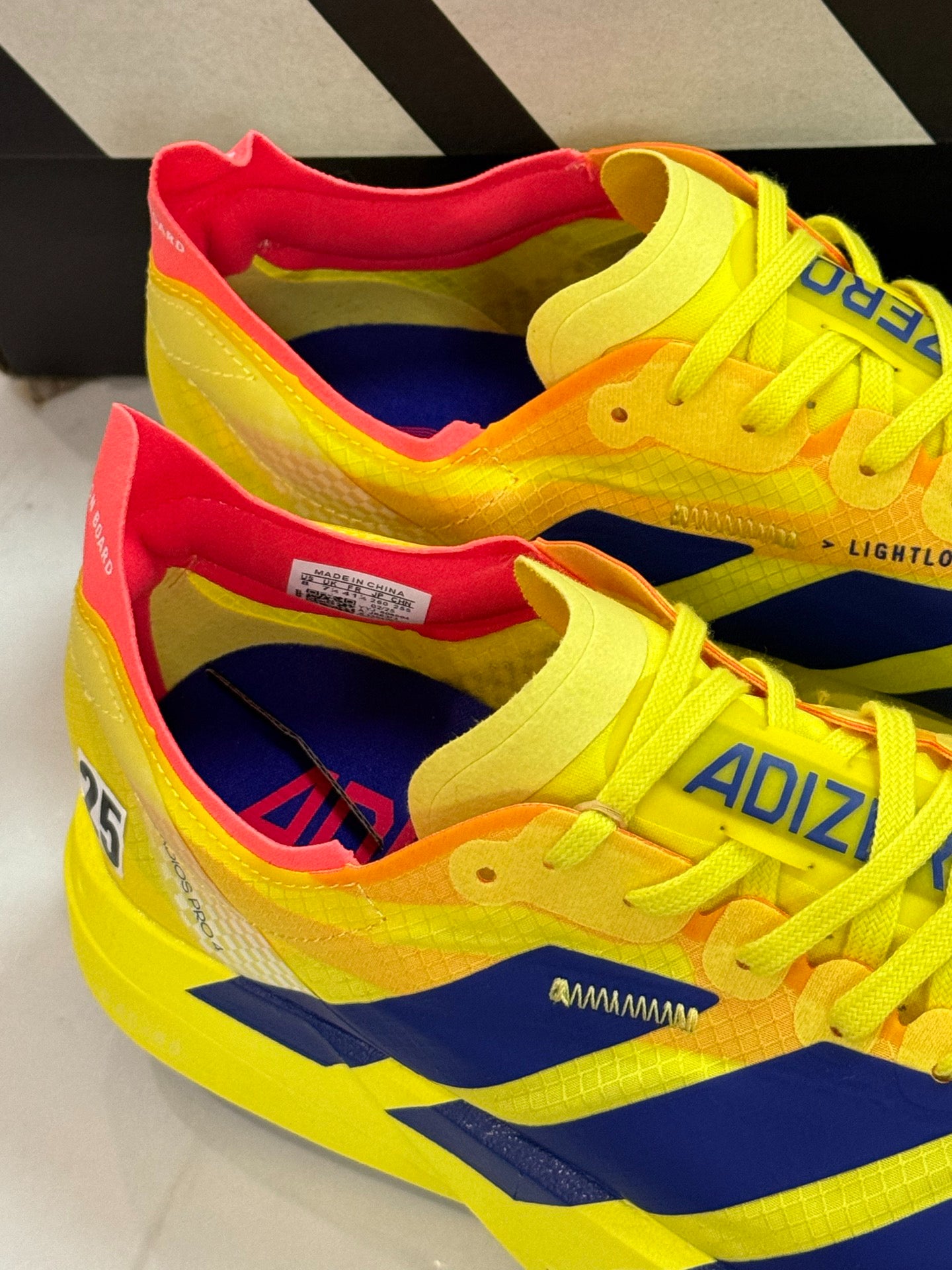 adidas Adizero Adios Pro 4 "Pure Sulfur / Yellow Navy"