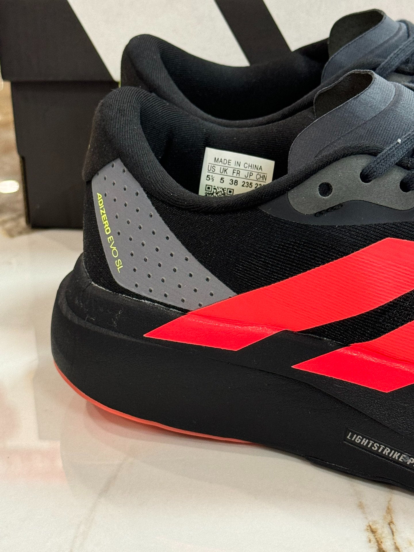 adidas Adizero Evo SL "Carbon Lucid Red"