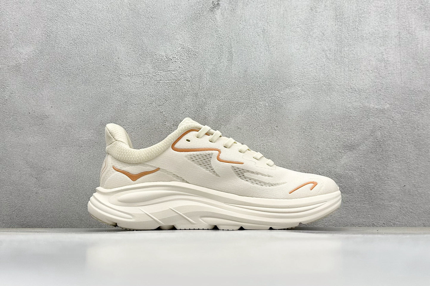 HOKA Clifton 10 Cream Peach Cushioned Road Running Sneakers