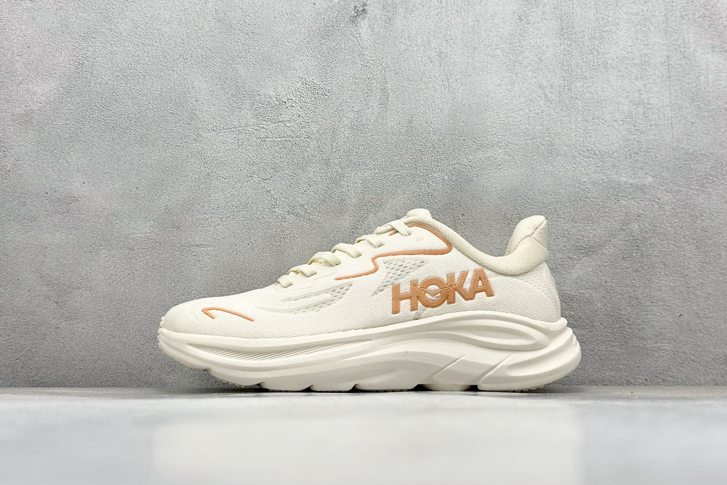 HOKA Clifton 10 Cream Peach Cushioned Road Running Sneakers