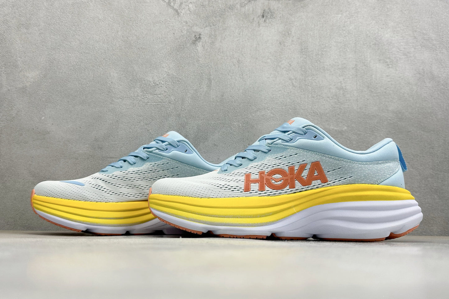 HOKA Bondi 8 Sky Blue Yellow Orange Logo Running Sneaker