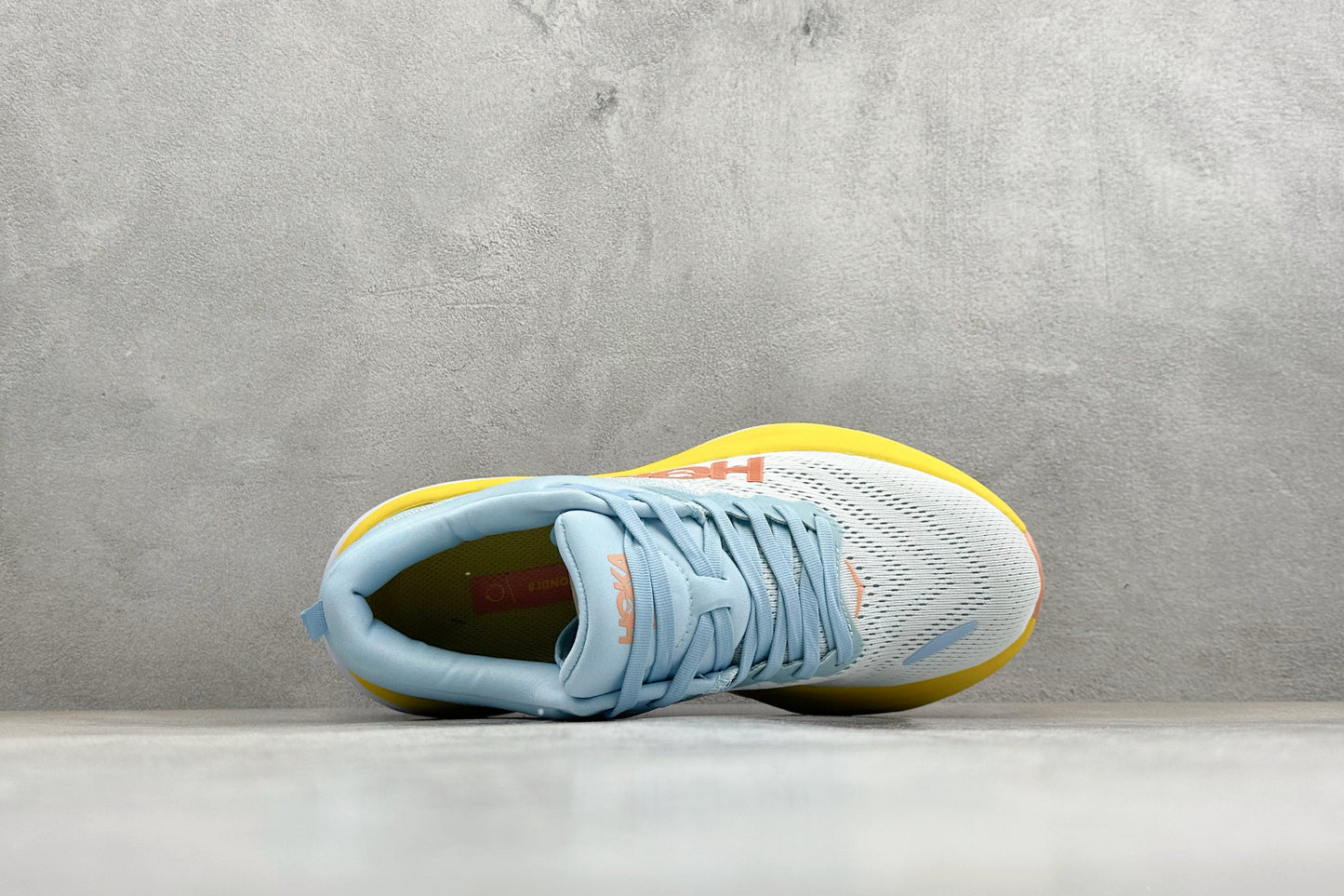 HOKA Bondi 8 Sky Blue Yellow Orange Logo Running Sneaker