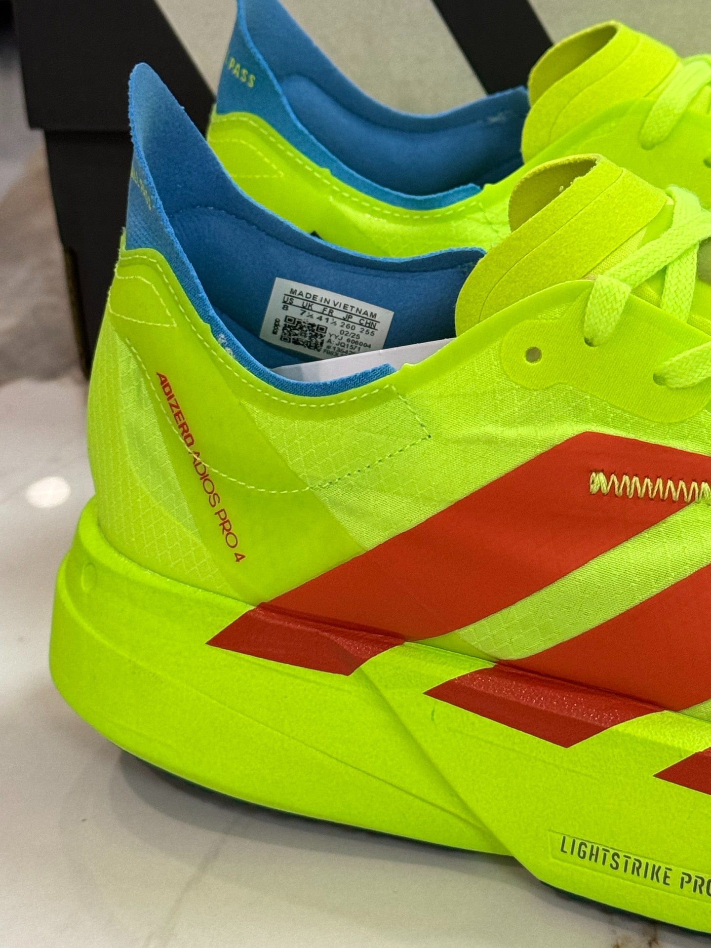 adidas Adizero Adios Pro 4 Running Shoes - Lucid Lemon / Spark Orange / Blue Fusion