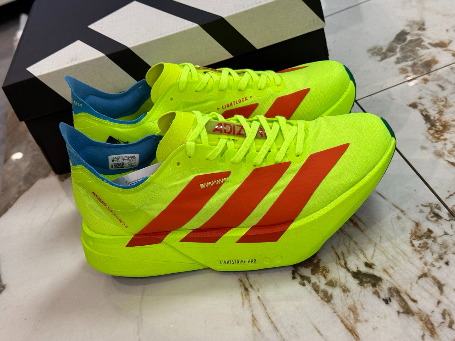 adidas Adizero Adios Pro 4 Running Shoes - Lucid Lemon / Spark Orange / Blue Fusion