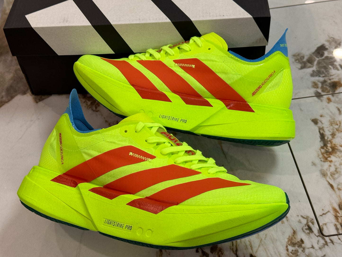 adidas Adizero Adios Pro 4 Running Shoes - Lucid Lemon / Spark Orange / Blue Fusion
