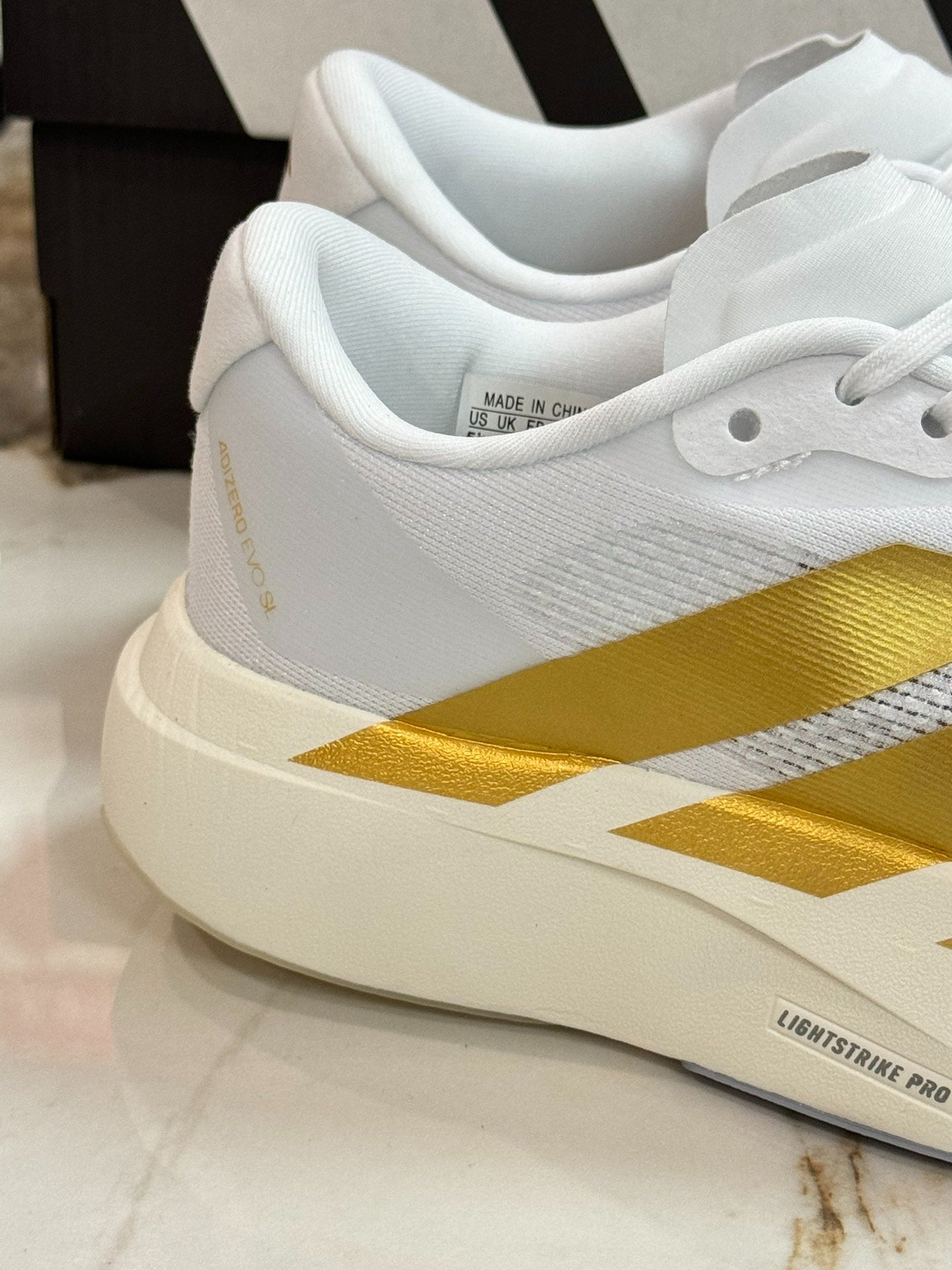 adidas Adizero Evo SL Woven "White Matte Gold"