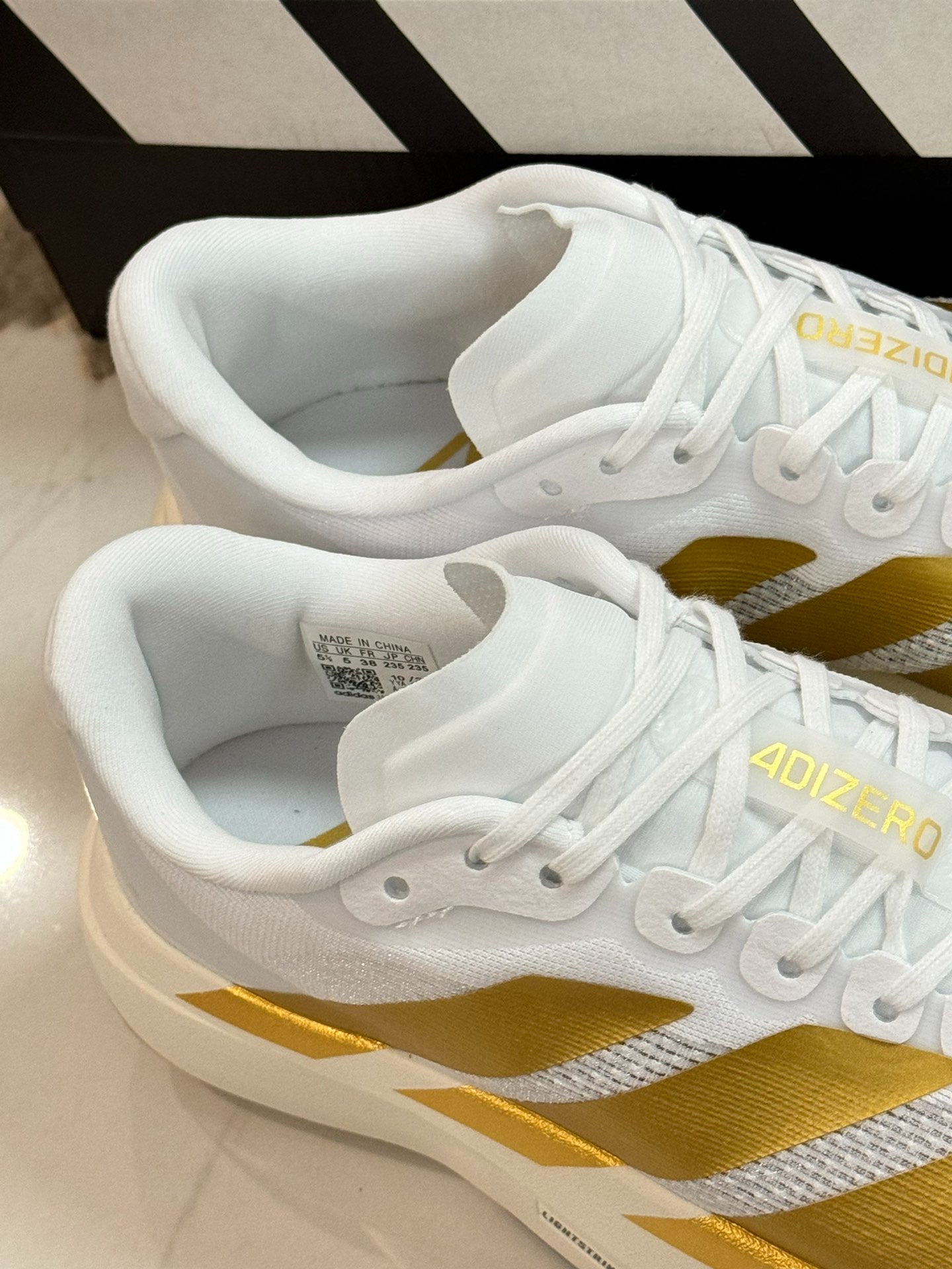 adidas Adizero Evo SL Woven "White Matte Gold"