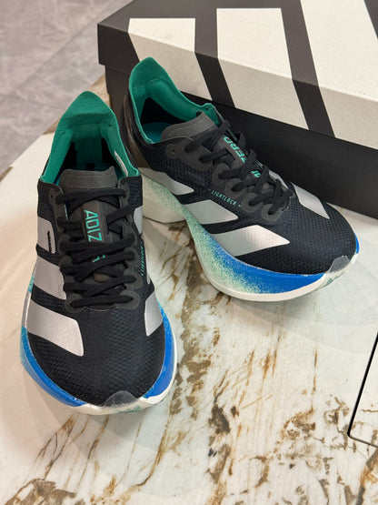 adidas Adizero Adios Pro 4 Running Shoes - Core Black / Matte Silver / Glory Green