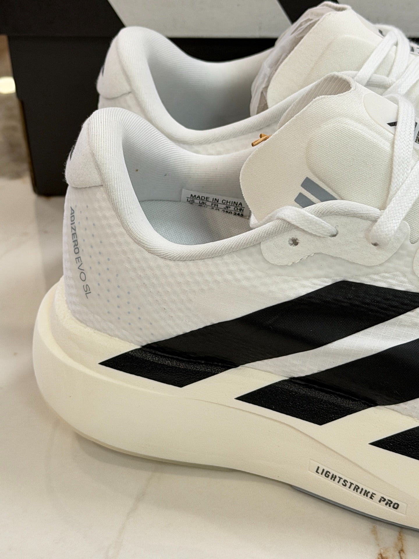 Adidas Adizero Evo SL Running Shoes (White/Black)