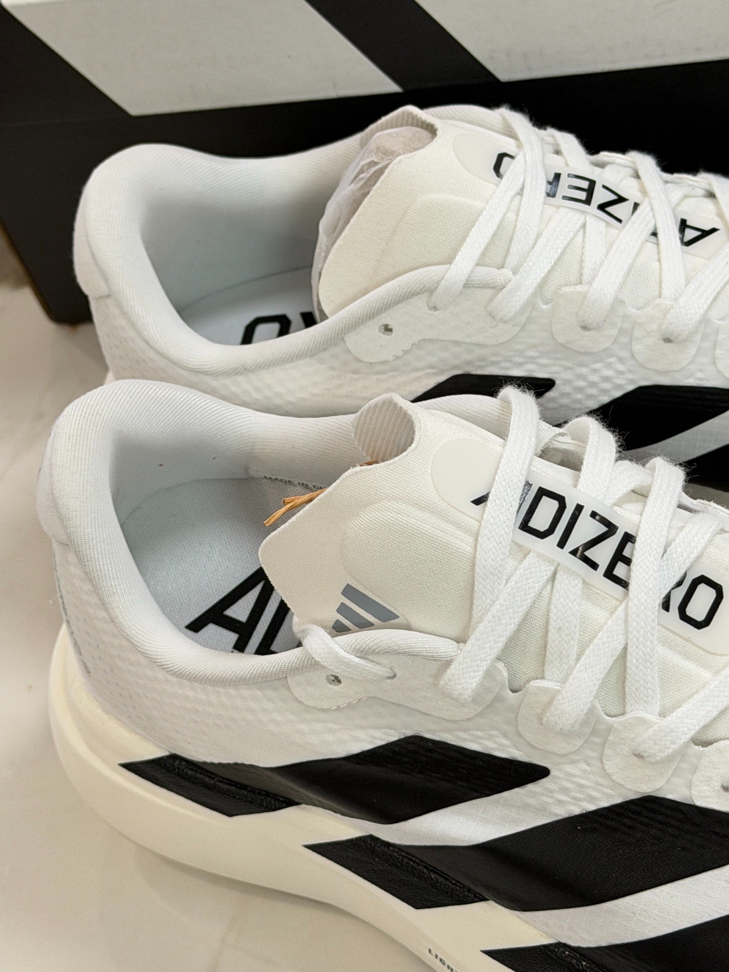 Adidas Adizero Evo SL Running Shoes (White/Black)