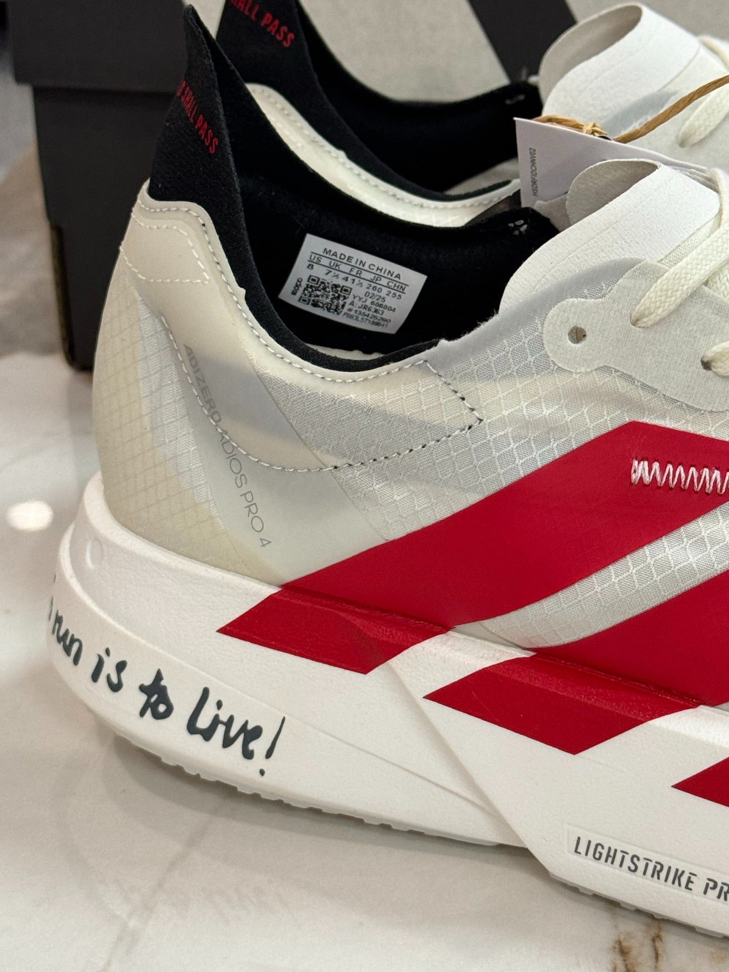 adidas Adizero Adios Pro 4 Running Shoes - Off White / Better Scarlet / Core Black