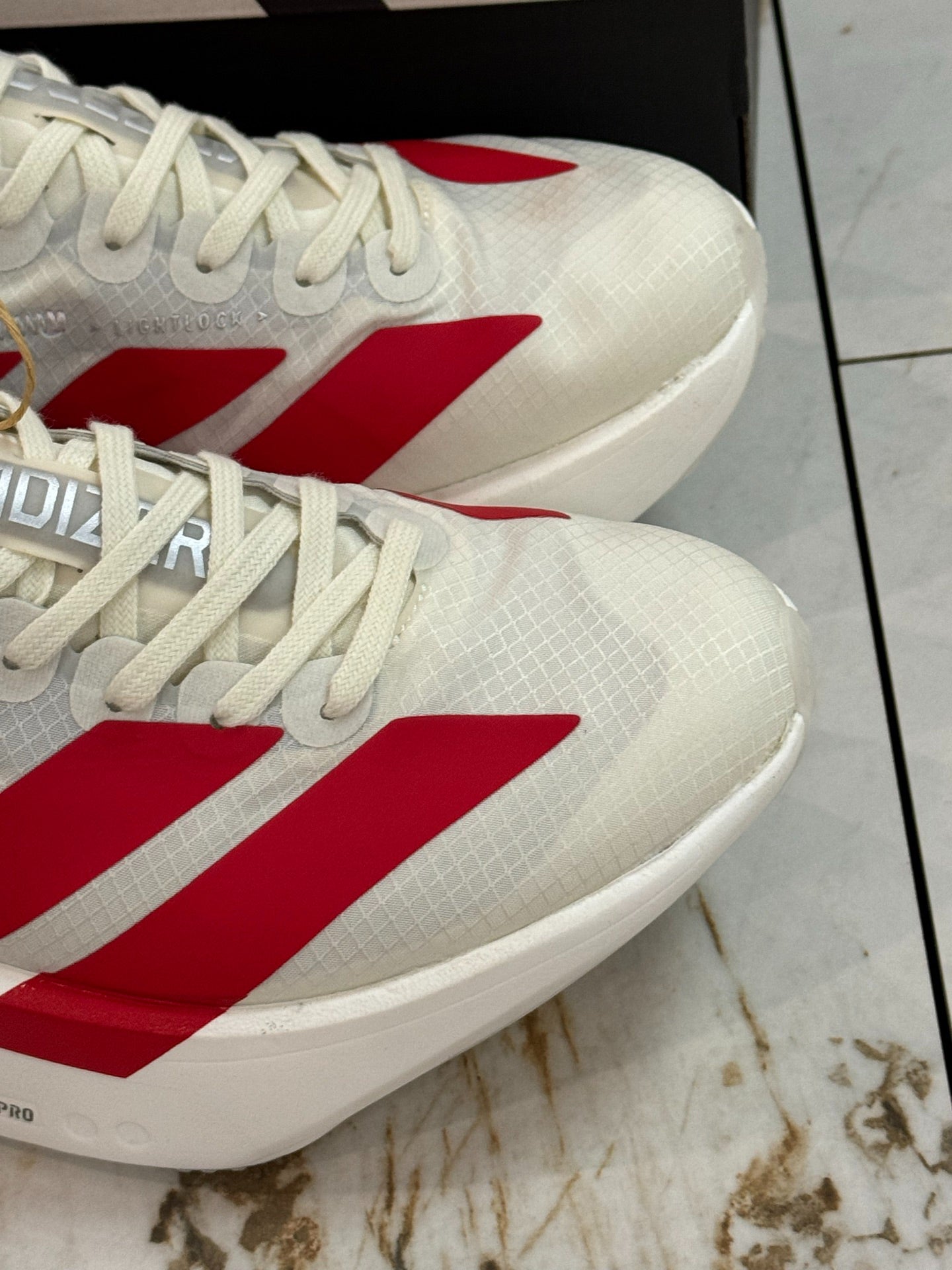 adidas Adizero Adios Pro 4 Running Shoes - Off White / Better Scarlet / Core Black