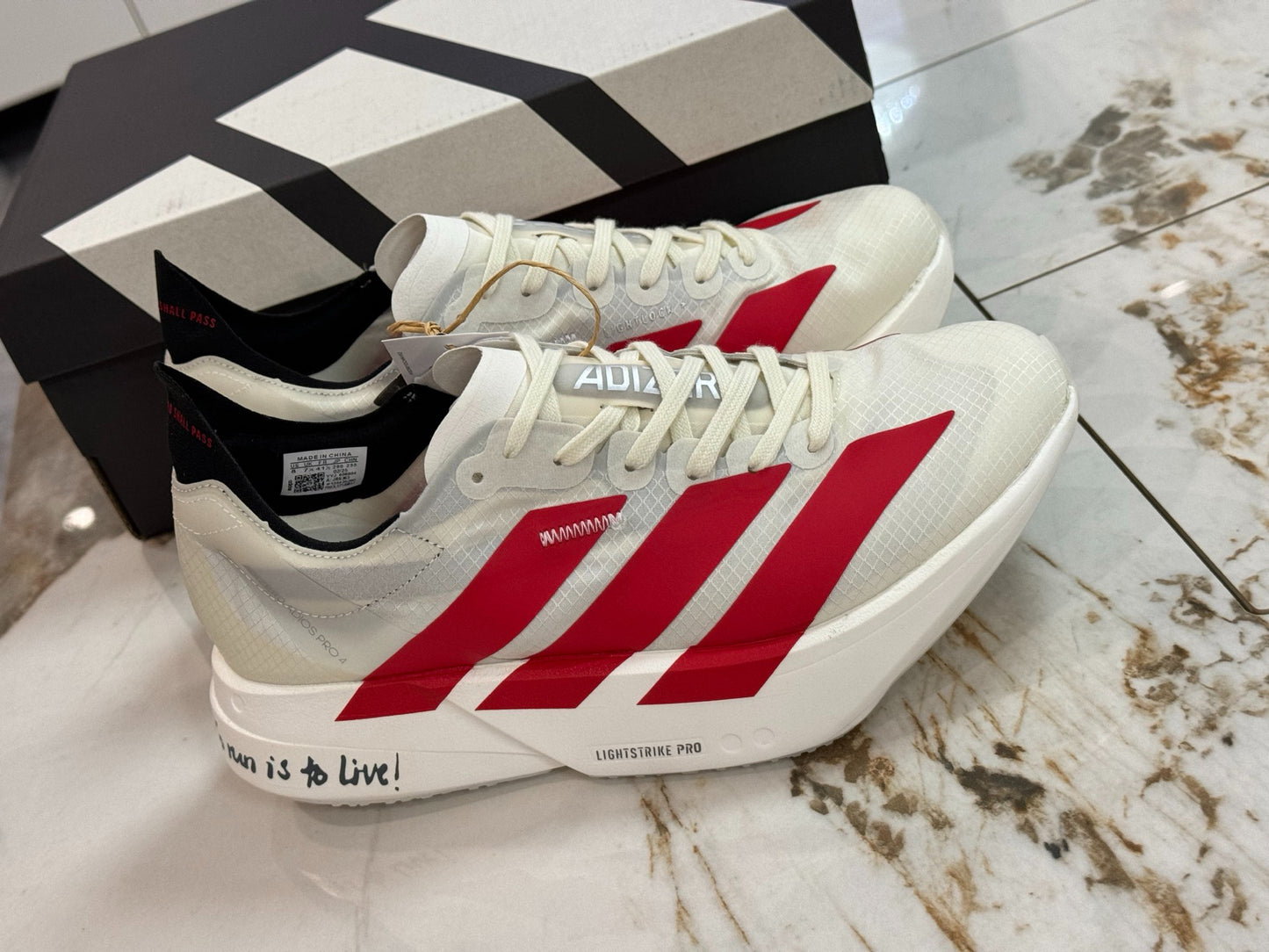adidas Adizero Adios Pro 4 Running Shoes - Off White / Better Scarlet / Core Black
