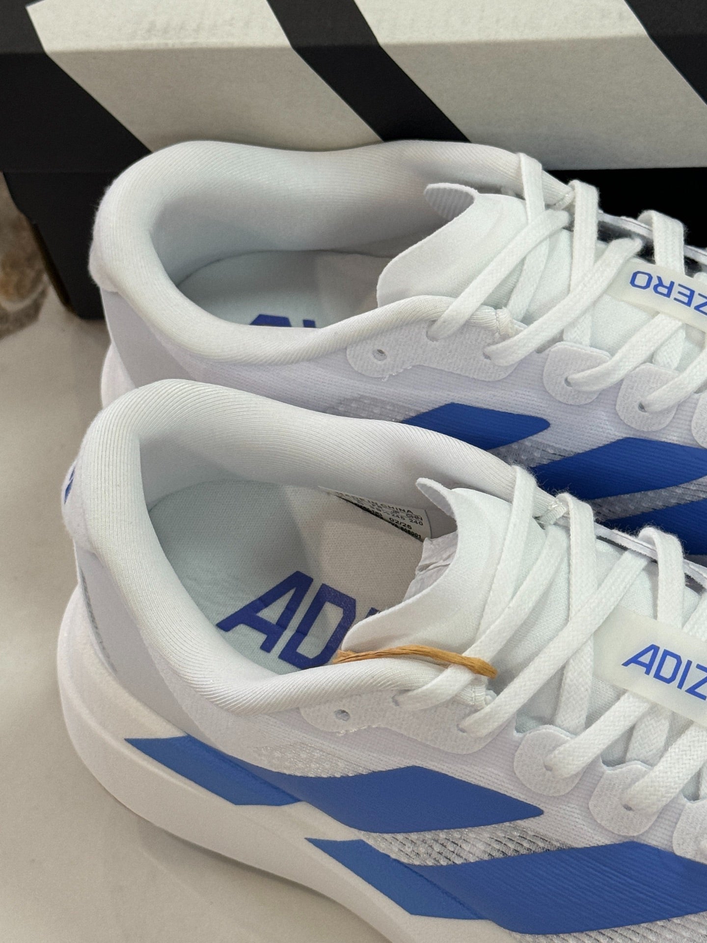 adidas Adizero Evo SL Running Shoes - Cloud White / Blue Fusion