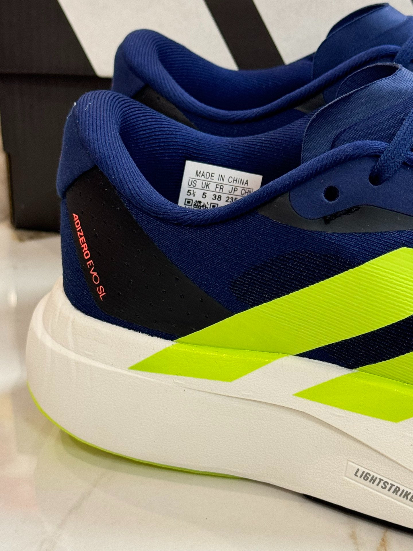 adidas Adizero Evo SL "Dark Blue Solar Slime"