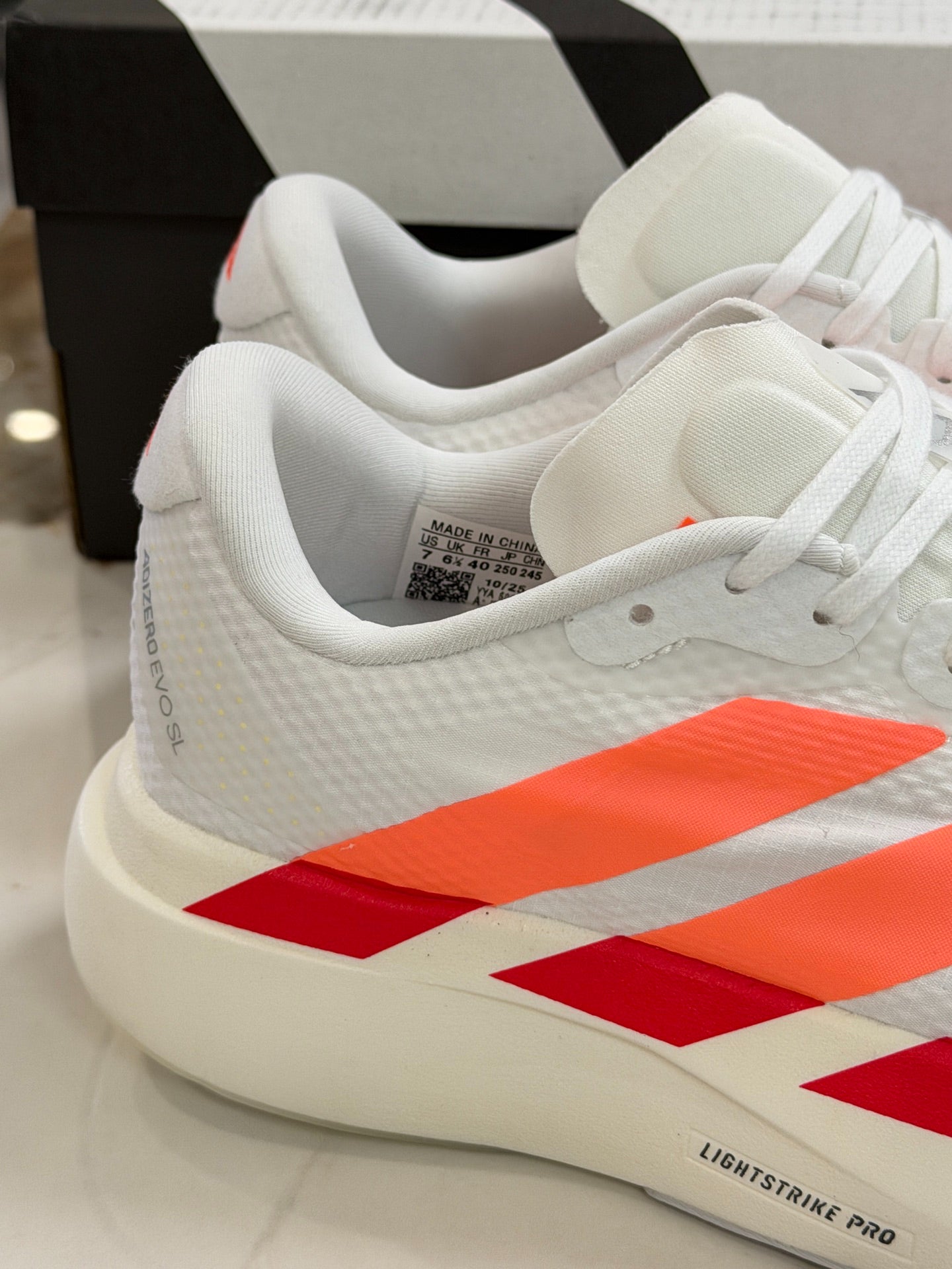 adidas Adizero Evo SL Running Shoes - Cloud White / Lucid Orange