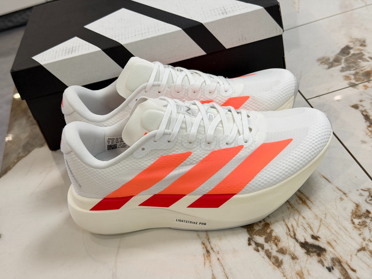 adidas Adizero Evo SL Running Shoes - Cloud White / Lucid Orange