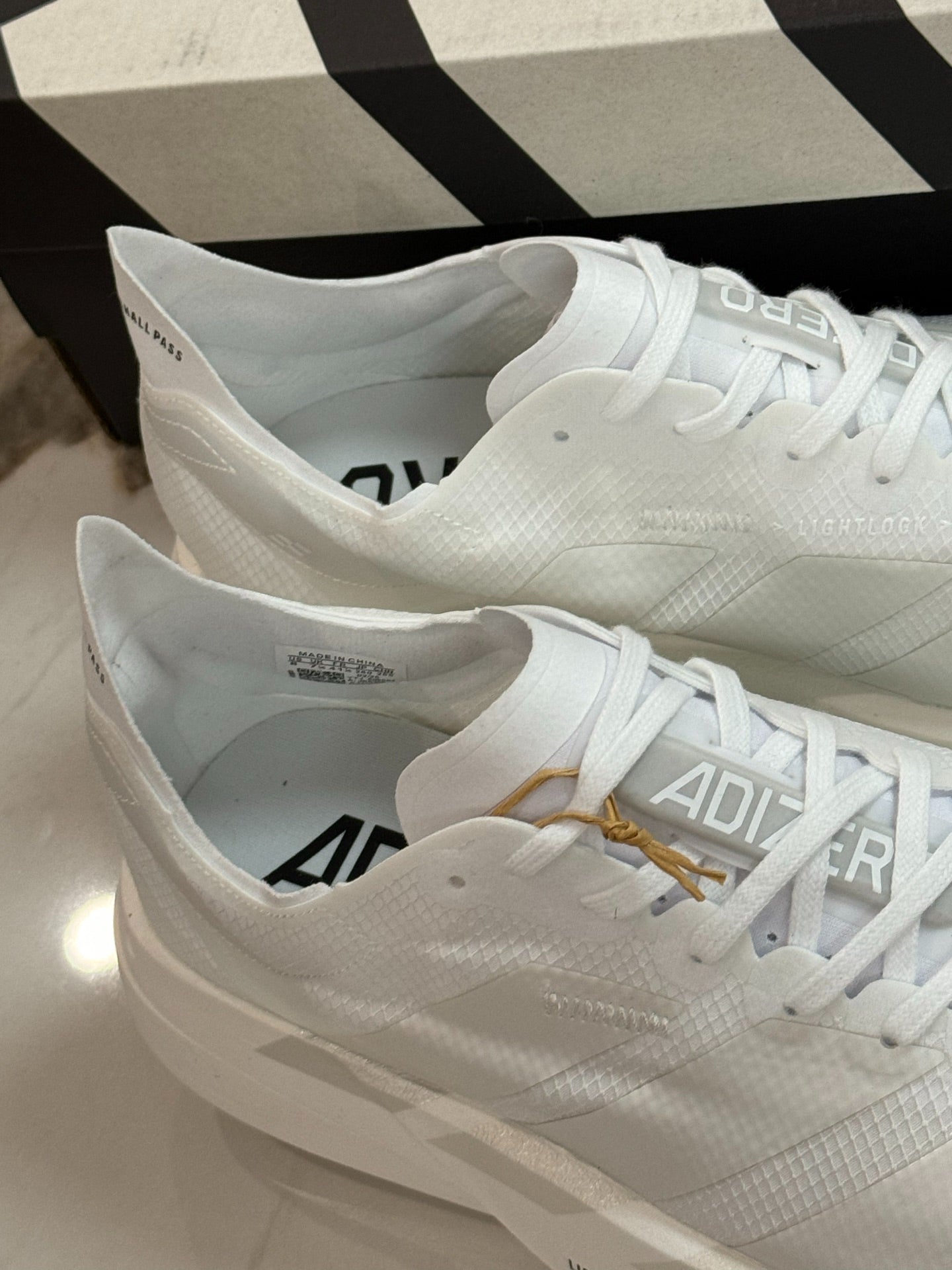 adidas Adizero Adios Pro 4 Running Shoes - Cloud White / Zero Metallic