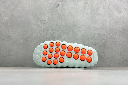 Nike Unisex "Neuro-Ball" Slide Sandal in Mint Green/Orange HQ4309-300