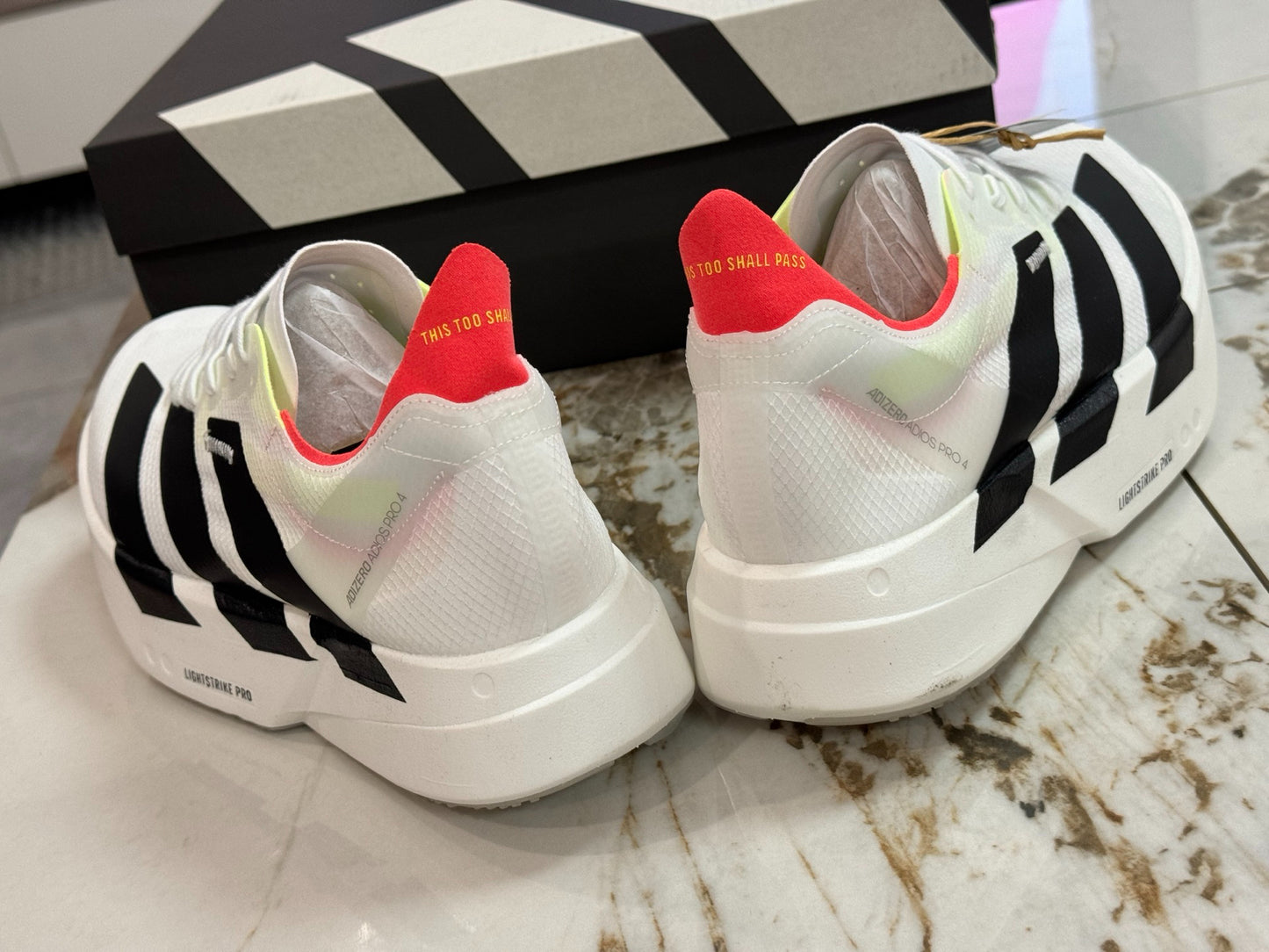 adidas Adizero Adios Pro 4 Running Shoes - Cloud White / Core Black / Silver Metallic