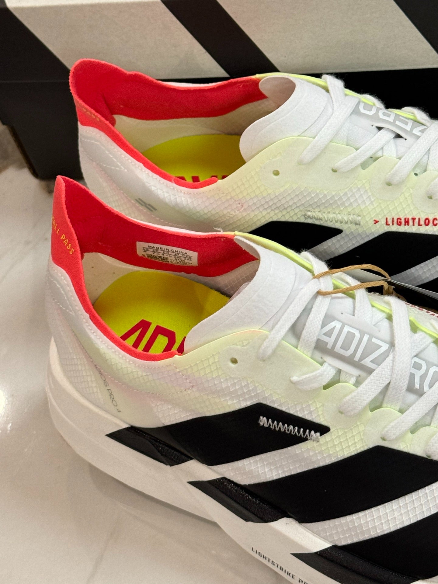 adidas Adizero Adios Pro 4 Running Shoes - Cloud White / Core Black / Silver Metallic