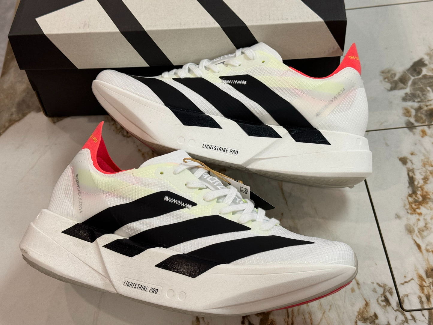 adidas Adizero Adios Pro 4 Running Shoes - Cloud White / Core Black / Silver Metallic