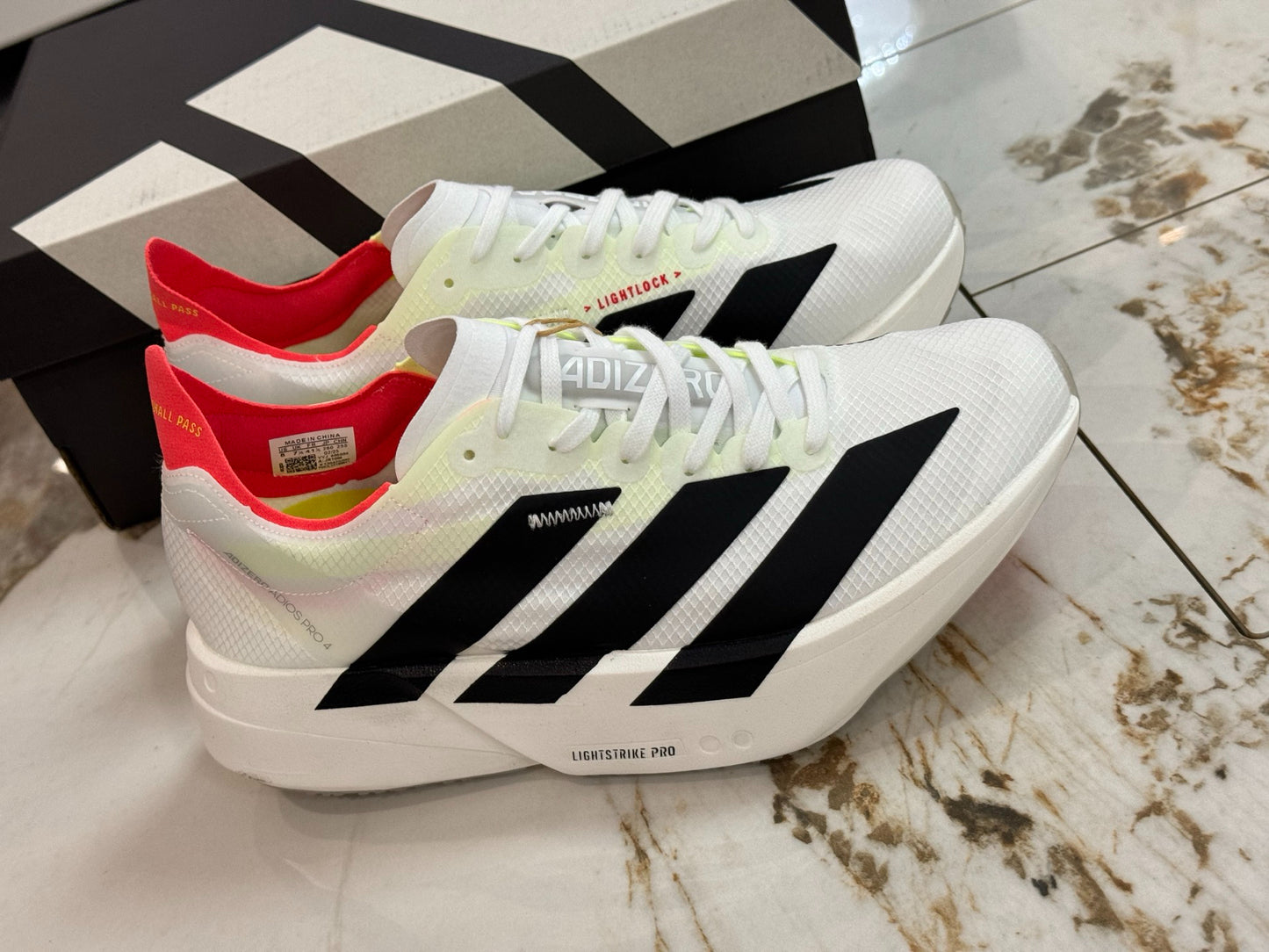 adidas Adizero Adios Pro 4 Running Shoes - Cloud White / Core Black / Silver Metallic