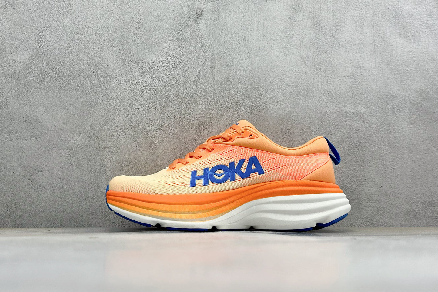 HOKA Bondi 8 Orange Gradient Blue Logo Running Shoes