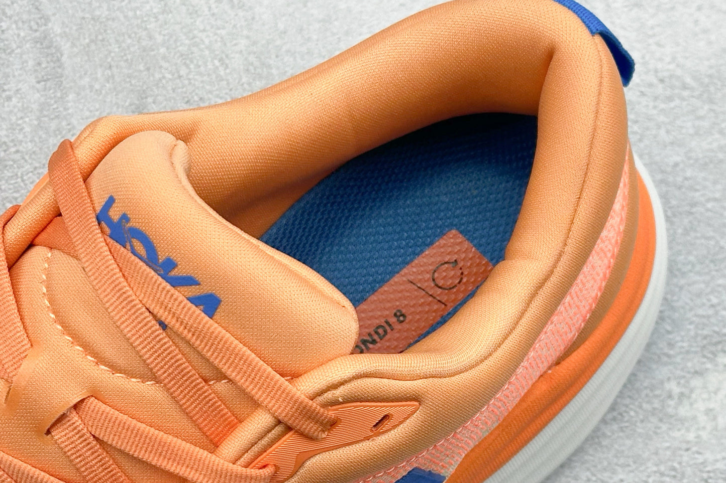 HOKA Bondi 8 Orange Gradient Blue Logo Running Shoes